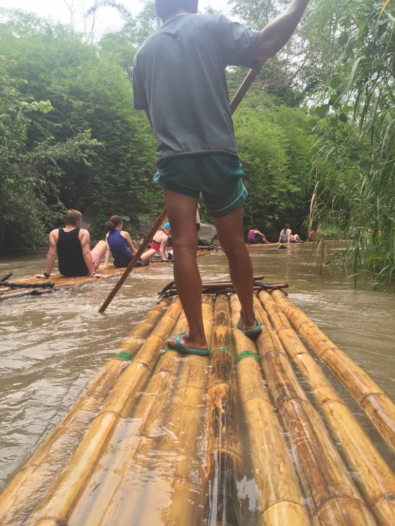 Our guides used thin bamboo rods as punting poles to navigate each raft downstream.